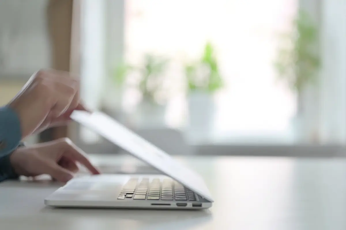 professional closing laptop going on vacation