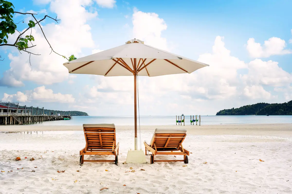 UAE beach resort calm sea private beach sun loungers